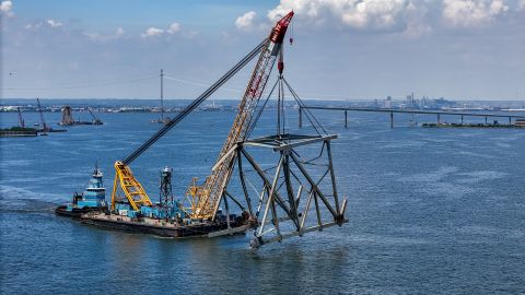 The Chesapeake 1000 crane barge carries the last large piece of the Francis Scott Key Bridge blocking the main shipping channel towards Tradepoint Atlantic Tuesday afternoon on June 04, 2024. Key Bridge Response Unified Command crews are now set to pull smaller chunks of debris out of the water before reopening the full 700-foot-wide channel into the Port of Baltimore. (Jerry Jackson/Baltimore Sun/Tribune News Service via Getty Images)