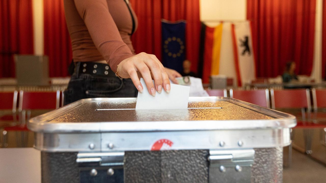 A voter casts her ballot at a polling station during the European Election in Berlin, Germany, on Sunday, June 9, 2024. The European Parliament election that wraps up on Sunday won't just decide the 720 lawmakers who will serve in the EU assembly for the next five years. Photographer: Krisztian Bocsi/Bloomberg via Getty Images