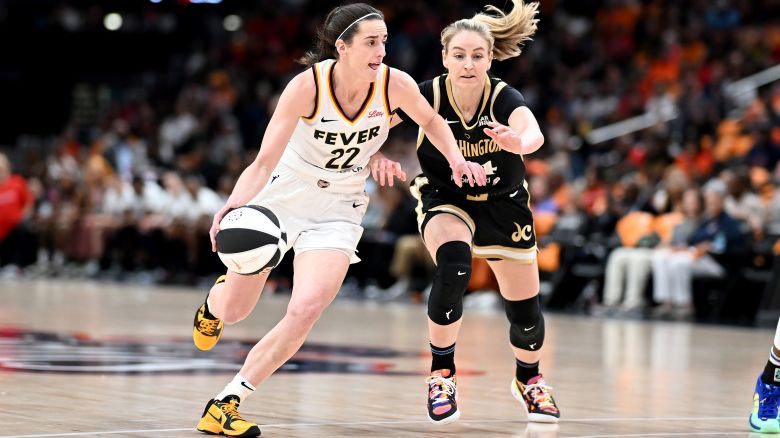 Caitlin Clark #22 of the Indiana Fever handles the ball in the first quarter against Karlie Samuelson #44 of the Washington Mystics at Capital One Arena on June 07, 2024 in Washington, DC.